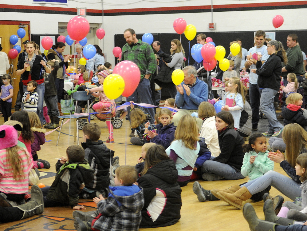 HEARTS FOR EZRA: Those attending Sunday’s Hearts for Ezra Auction and Fundraiser at Hall-Dale High School listen to a concert Sunday, one of many features of the kid-friendly event. Money raised assists in researching a cure for spinal muscular atrophy.