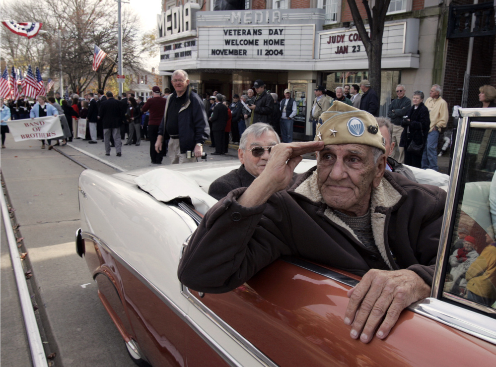 This Nov. 11, 2004 file photo shows William “Wild Bill” Guarnere participating in the Veterans Day parade in Media, Pa.