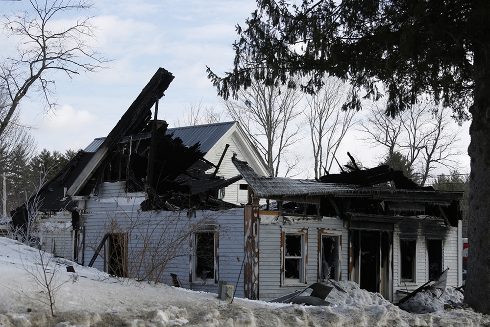 A woman who lived in this house in Limington was killed in an early-morning fire Monday.