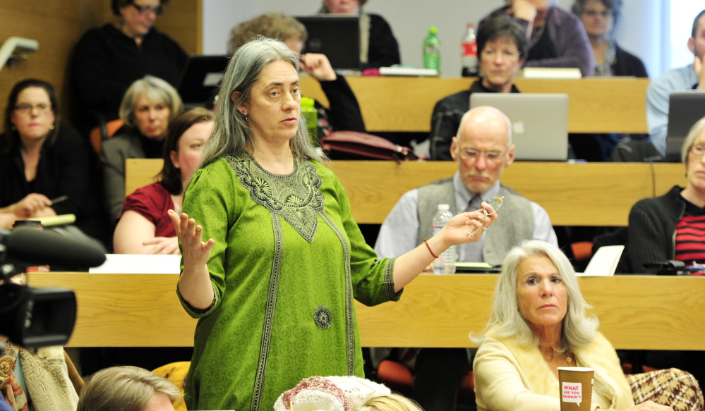 Assunta Kent, an associate professor of theatre, makes a point Friday after USM President Theodora Kalikow announced cutbacks to the school’s budget which could result in as many as 50 faculty and staff layoffs.