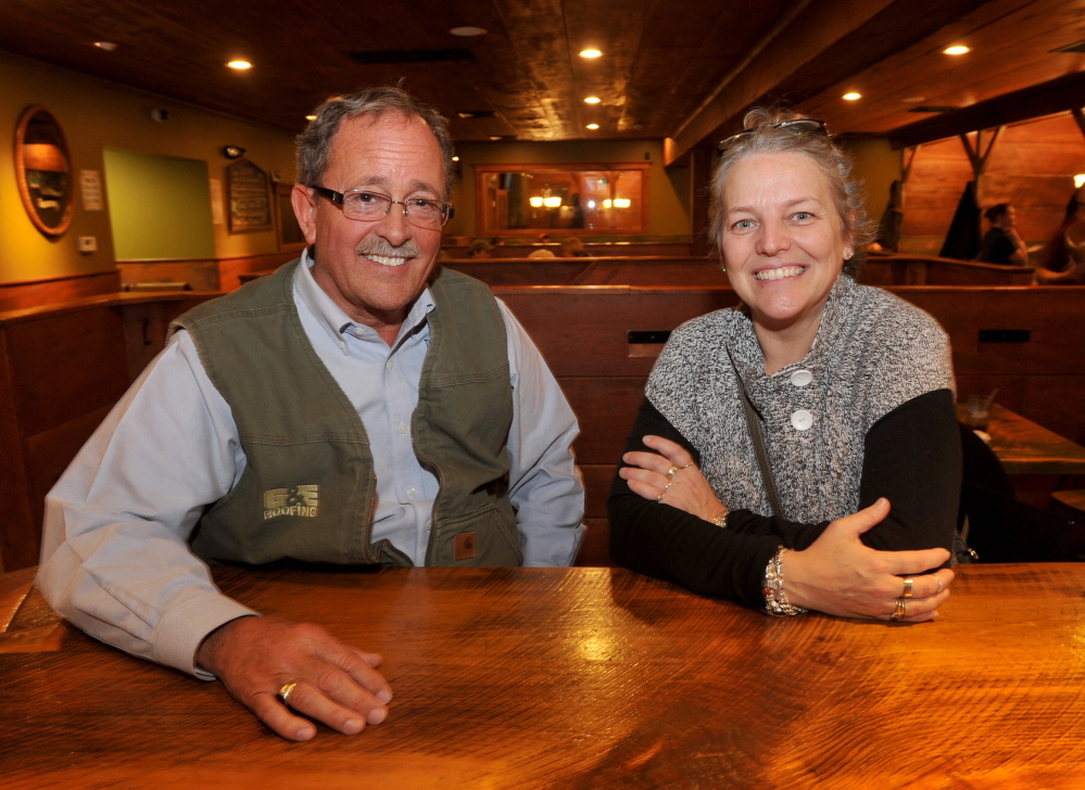 CURRENT AND FUTURE OWN-AHS: Norm Elvin, left, current owner of the China-Dineah, and future owner Lisa Wardwell at the China Dine-ah in South China on Friday, March 14, 2014.