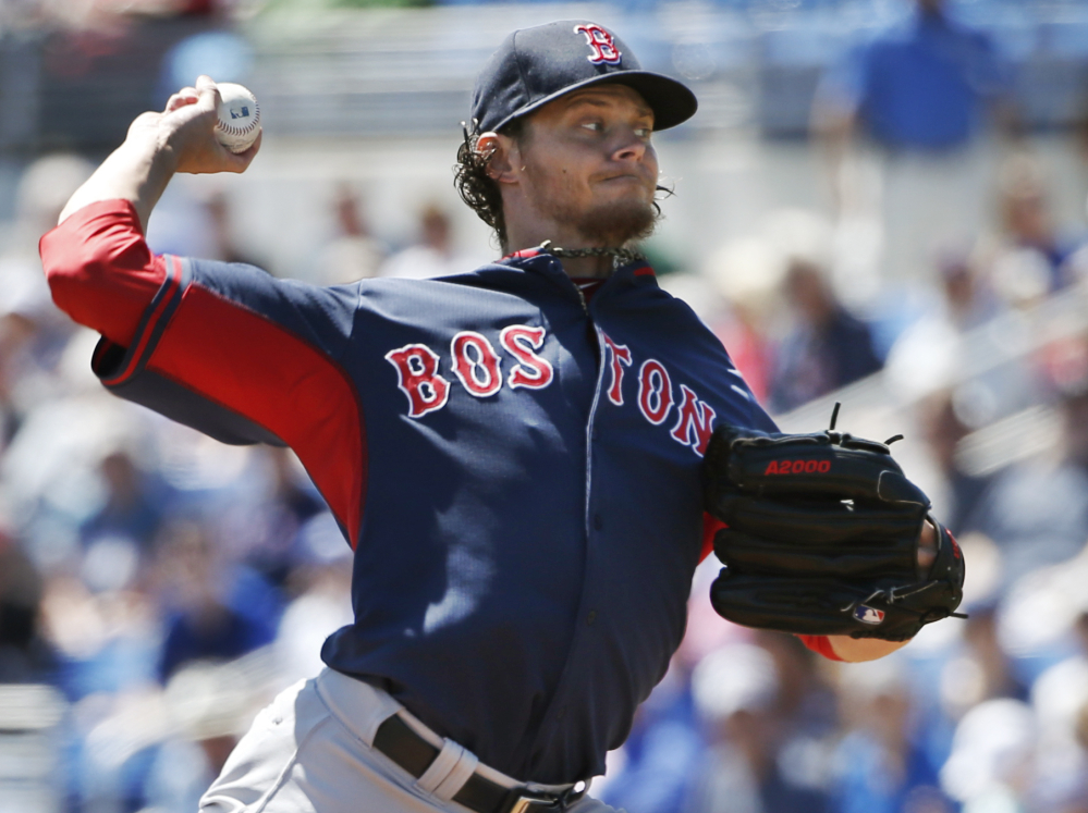 Boston’s Clay Buchholz is in command Friday afternoon in Dunedin, Fla., blanking the Toronto Blue Jays in his four innings on the mound. Buchholz was 12-1 last season before being sidelined with injuries.