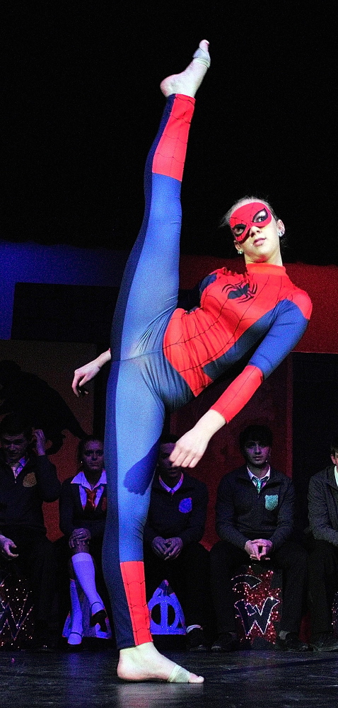 Web sight: Olivia Rancourt dances in a Spiderman costume during a Chizzle Wizzle rehearsal Friday at Cony High School in Augusta.