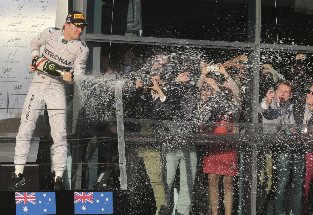 Mercedes driver Nico Rosberg of Germany sprays champagne in celebration after winning the Australian Formula One Grand Prix at Albert Park in Melbourne, Australia, on Sunday.