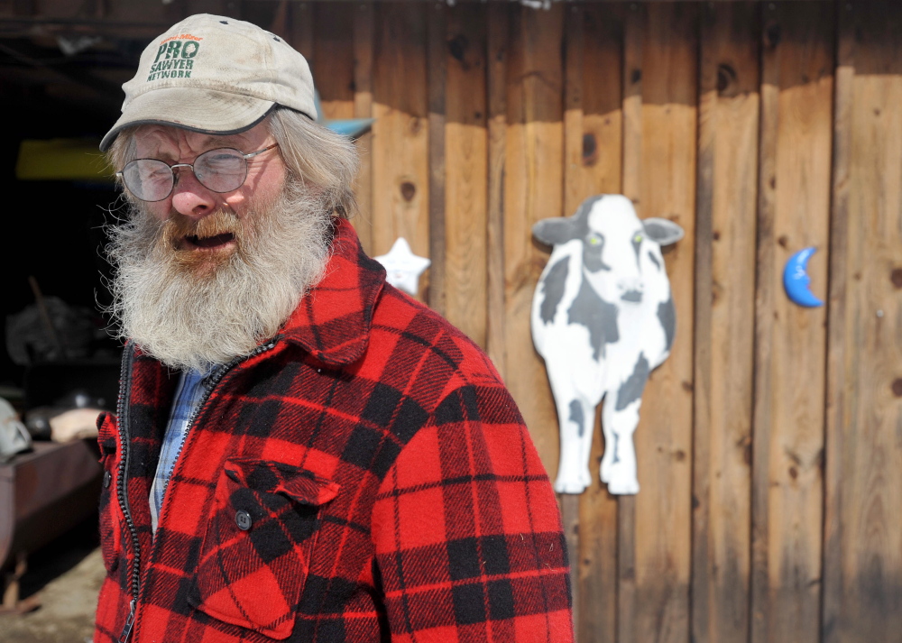 Part of the package: Along with chickens, Dan Charles raises cattle and goats at his small farm in Mercer.