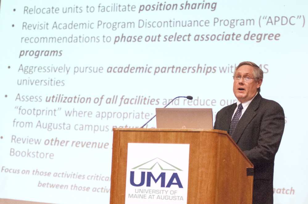 UMA cuts: Tim Brokaw, vice president of finance and administration, gives a presentation on proposed budget cuts during a meeting on Wednesday in Jewett Hall at the University of Maine at Augusta.