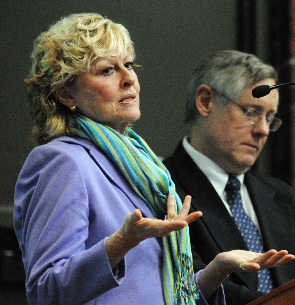UMA Cuts: Allyson Handley, university president, left and Tim Brokaw, vice president of finance and administration, take questions from the audience on proposed budget cuts during a meeting on Wednesday in Jewett Hall at the University of Maine at Augusta.