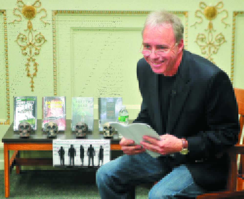 Staff file photo by Joe Phelan RIDING THE CRIME WAVE: Central Maine crime fiction writer Gerry Boyle, seen here reading to an audience at Augusta’s Lithgow Library in 2012, will be one of a number of mystery writers who live in the state featured at the April 19 Crime Wave conference in Portland, sponsored by the Maine Writers and Publishers Alliance.