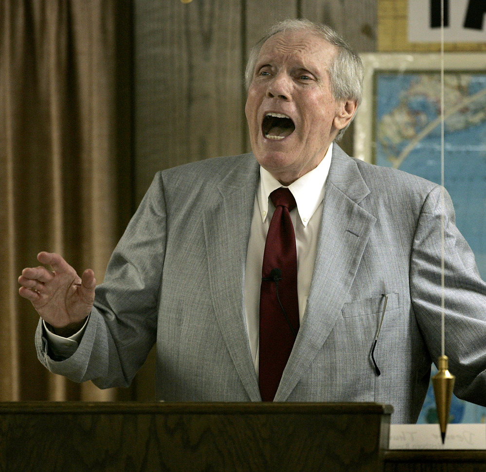The Rev. Fred Phelps Sr. preaches at his Westboro Baptist Church in Topeka, Kan., in this 2006 file photo.