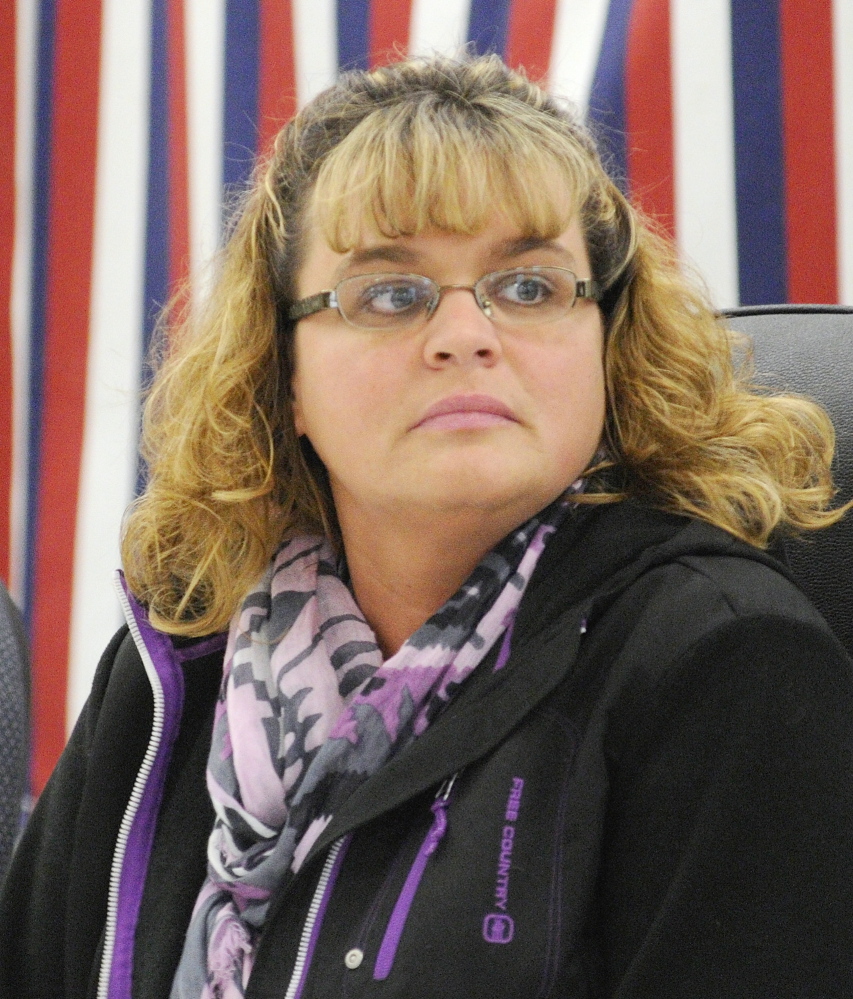 New Clerk: Angela Phillis sits at the head table after she was elected town clerk before the start of the 163rd West Gardiner Town Meeting on Saturday at the West Gardiner Fire Station.