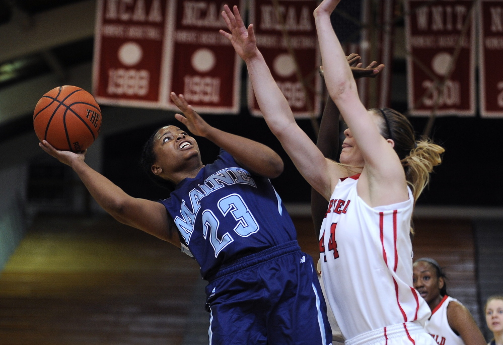 Maine’s Ashleigh Roberts goes up for a shot against Fairfield’s Katie Cizynski during a second-round game Sunday in the Women’s Basketball Invitational at Fairfield, Conn. Roberts ended her career with 24 points in a 63-50 defeat.