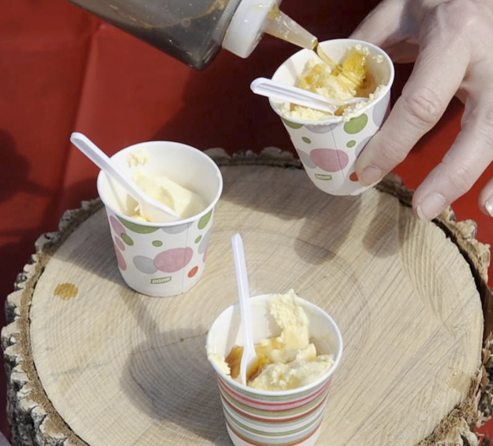 Ice cream: Because the cold weather this year has kept the sap from flowing, only a few pints of syrup have been produced at Maine-iac Maple Farms Richmond. It was used to top ice cream for visitors on Maine Maple Sunday on Sunday in Richmond.