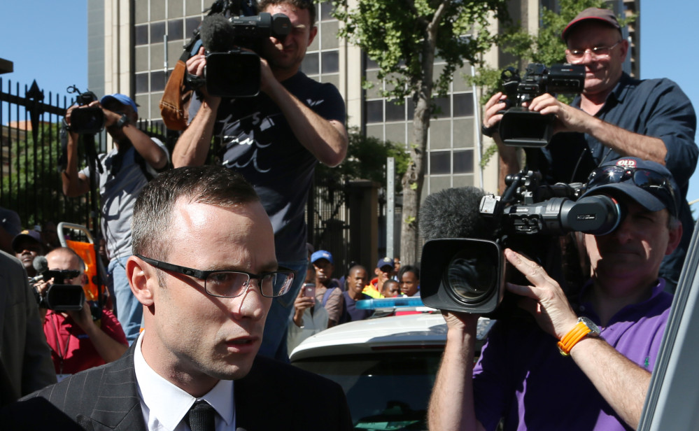 Oscar Pistorius leaves the high court in Pretoria, South Africa, Tuesday.