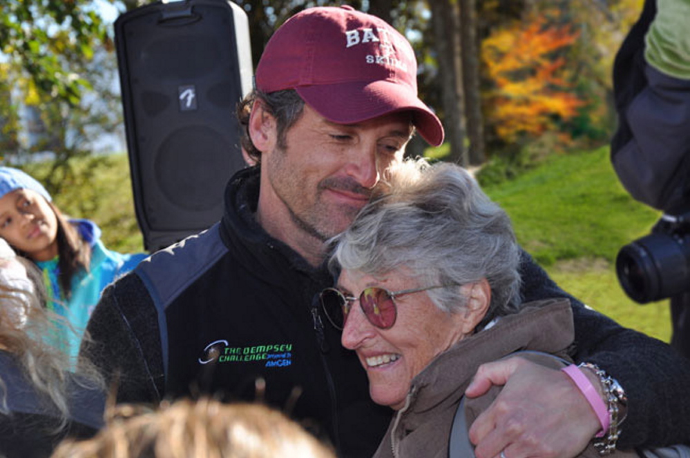 Patrick Dempsey hugs his mother, Amanda Dempsey, a cancer survivor whose struggle inspired her son to establish The Patrick Dempsey Center for Cancer Hope & Healing in Lewiston.