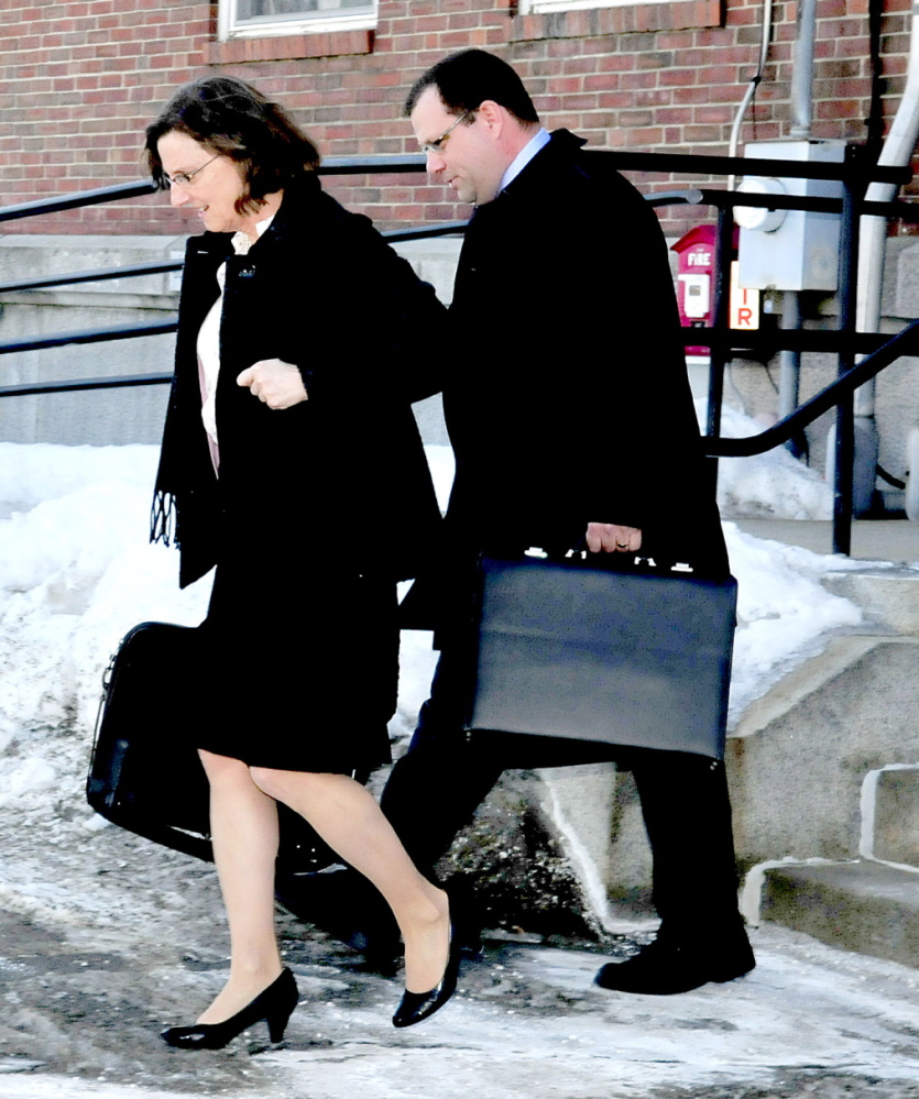 DEFENSE: Attorney John Martin and a colleague leave Skowhegan District Court on Thursday after a hearing on the competence on his client Kelli Murphy, 12, charged in the death of 3-month-old Brooklyn Foss-Greenaway.