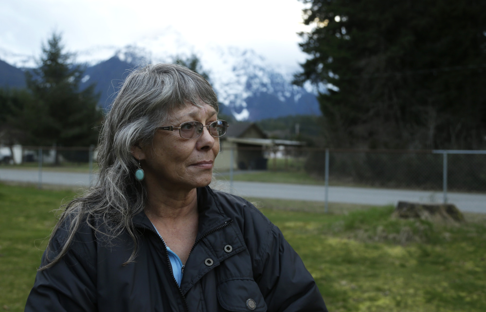 Robin Youngblood survived the massive mudslide that hit the nearby community of Oso, Wash., last Saturday. She was rescued by a helicopter as she floated on a piece of a roof.