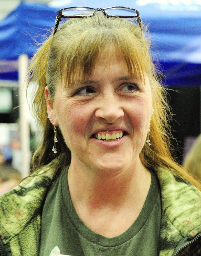 Food on the table: Lorri Nelson talks on Saturday about the bear hunt referendum during an interview at the Maine Sportsman’s Show on Saturday in the Augusta Civic Center.