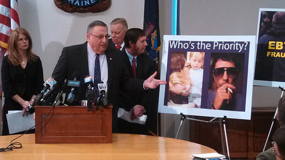 Who’s the priority?: Gov. Paul LePage unveils his welfare reform proposals at a State House news conference on Monday, as Maine DHHS Commissioner Mary Mayhew, left, looks on.