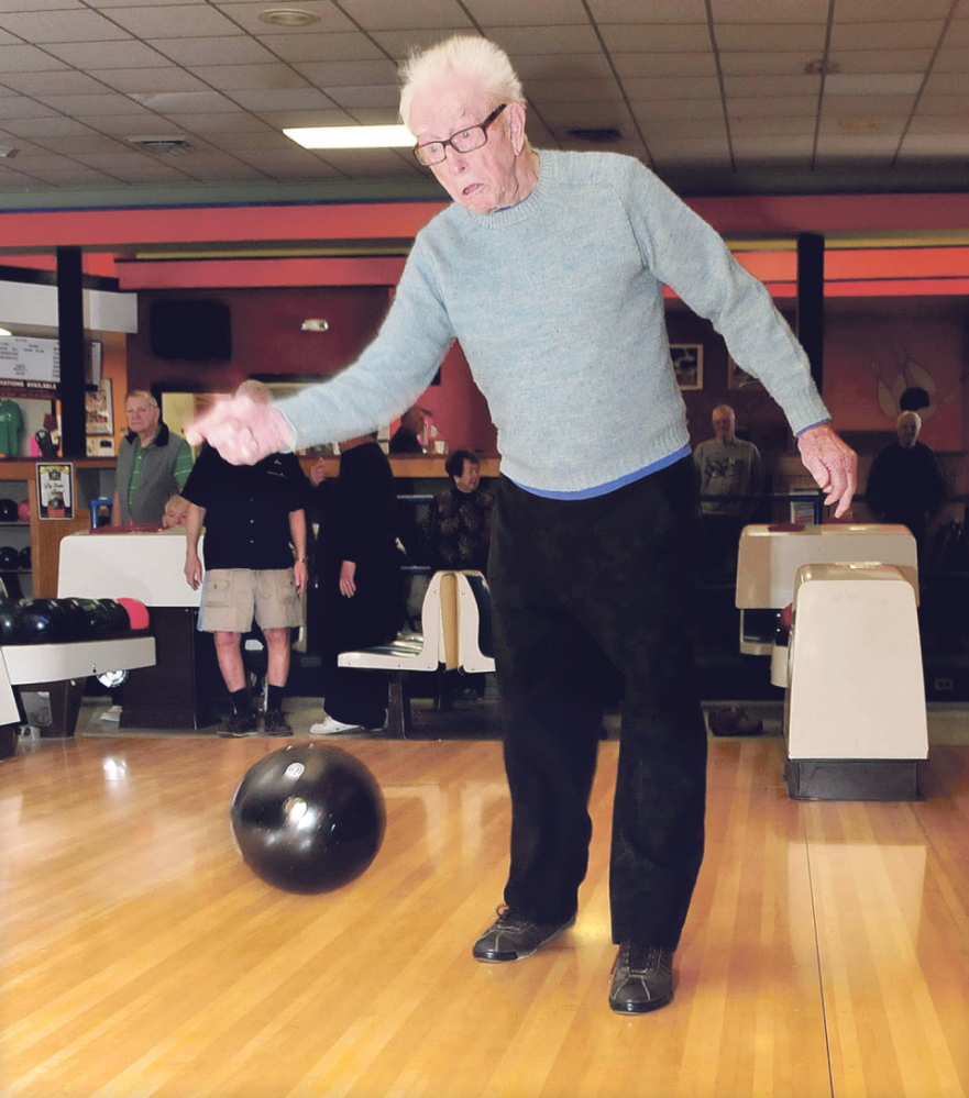 Staff photo by David Leaming STILL ROLLING: Red Ryer, 98, still actively bowls with the Primetimes league at the Sparetime Bowling Center in Waterville on Monday, March 24, 2014.