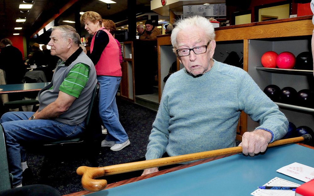 Staff photo by David Leaming NEVER TOO OLD: Red Ryer, 98, still uses a cane to walk but has no problem actively bowling in a seniors league at the Sparetime Bowling center in Waterville.