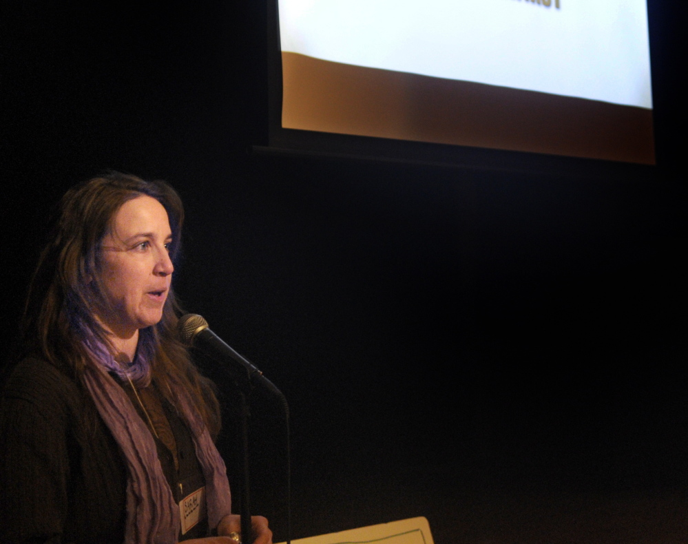 FOOD MOGUL: Sarah Miller introduces the documentary film “Fresh” on Sunday at Johnson Hall Performing Arts Center in Gardiner. Miller’s group, the Gardiner Food Co-Op and Cafe, sponsored the event.