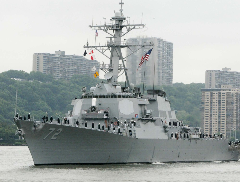 A sailor was fatally shot aboard the USS Mahan, shown in the Hudson River in New York, while it was at Naval Station Norfolk on March 24. His attacker was then killed by security forces.