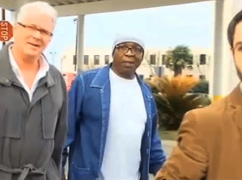 In this frame grab from video provided by WAFB-TV 9, Glenn Ford, 64, center, walks out of a maximum security prison, Tuesday, March 11, 2014, in Angola, La., after having spent nearly 26 years on death row. Ford walked free Tuesday evening hours after a judge approved the state’s motion to vacate his murder conviction in the 1983 killing of a jeweler. State District Judge Ramona Emanuel on Monday took the step of voiding Ford's conviction and sentence based on new information that corroborated his claim that he was not present or involved in the murder.