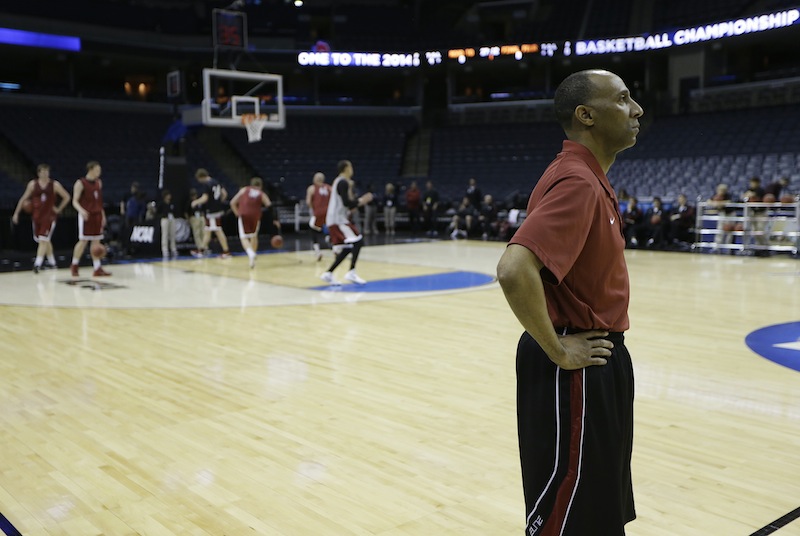 Stanford head coach Johnny Dawkins watches during practice at the NCAA college basketball tournament, Wednesday, March 26, 2014, in Memphis, Tenn. Stanford plays Dayton in a regional semifinal on Thursday. FEDEX FORUM March Madness