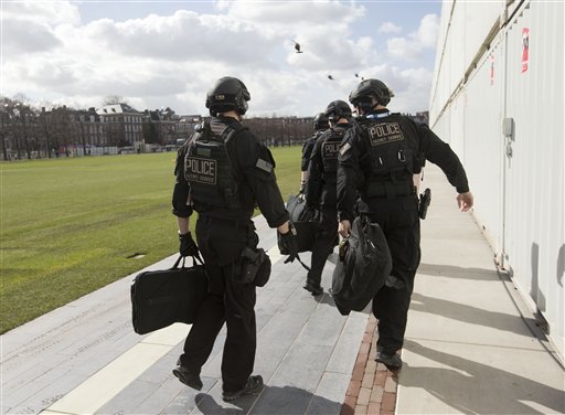Members of the Secret Service Counter Assault Team, known in the agency as CAT, are seen before boarding helicopters in Amsterdam Monday.