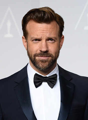 Jason Sudeikis poses in the press room during the Oscars on March 2, 2014, in Los Angeles.