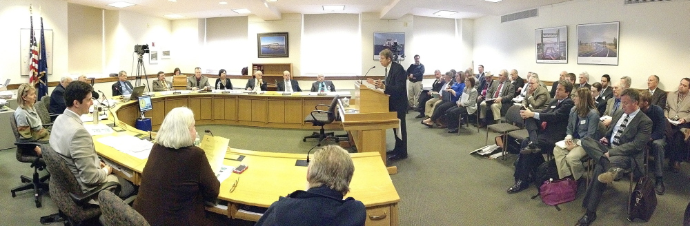 Maine Turnpike Authority Executive Director Peter Mills testifies in favor of the bill during a hearing on LD 1831 in the State House on Tuesday April 1, 2014 in Augusta.