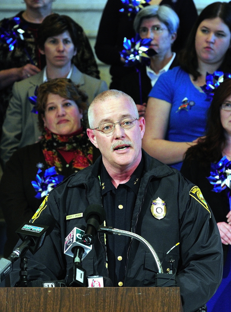 OUNCE OF PREVENTION: Augusta Police Chief Robert Gregoire speaks during a news conference held Tuesday in the State House Hall of Flags to kick off Child Abuse Prevention Month.
