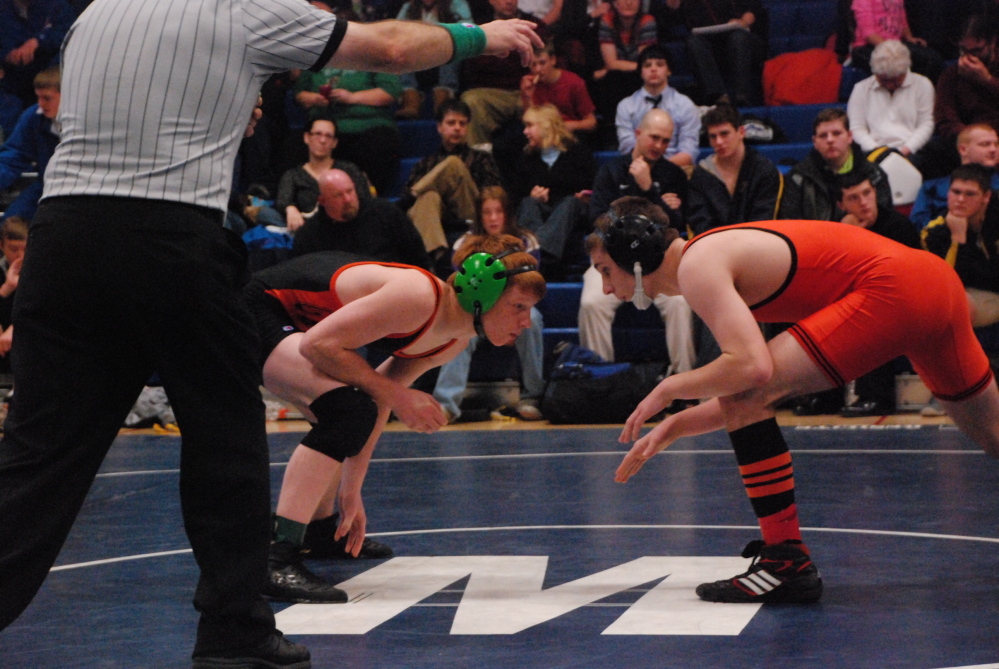 GOOD DAY: Peter Del Gallo, left, wrestles Tyler Craig, of Skowhegan, at a match earlier this season. Del Gallo capped a standout season by finishing third at nationals in the 113-pound weight class last weekend at Virginia Beach.