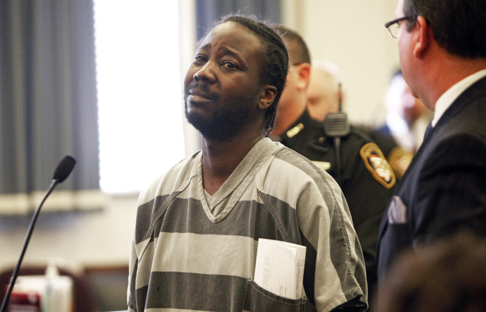 In this Thursday, Jan. 16, 2014 file photo, Deandre Kelley reacts in Hamilton County Common Pleas Court, in Cincinnati. Kelley was sentenced to six years in prison Wednesday, April 2, 2014, after he pleaded guilty to the accidental shooting death of his 11-year-old daughter during a drunken fight with the girl’s mother.