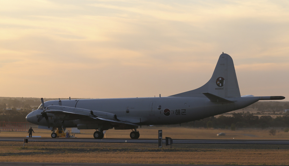 A South Korean Navy P-3 Orion sits on the runway after returning from a search operation for the missing Malaysia Airlines Flight MH370, at Royal Australian Air Force base Peace in Perth, Australia, Thursday, April 3, 2014. The search operation continues but no trace of the Boeing 777 has been found nearly a month after it vanished in the early hours of March 8 on a flight from Kuala Lumpur to Beijing with 239 people on board.