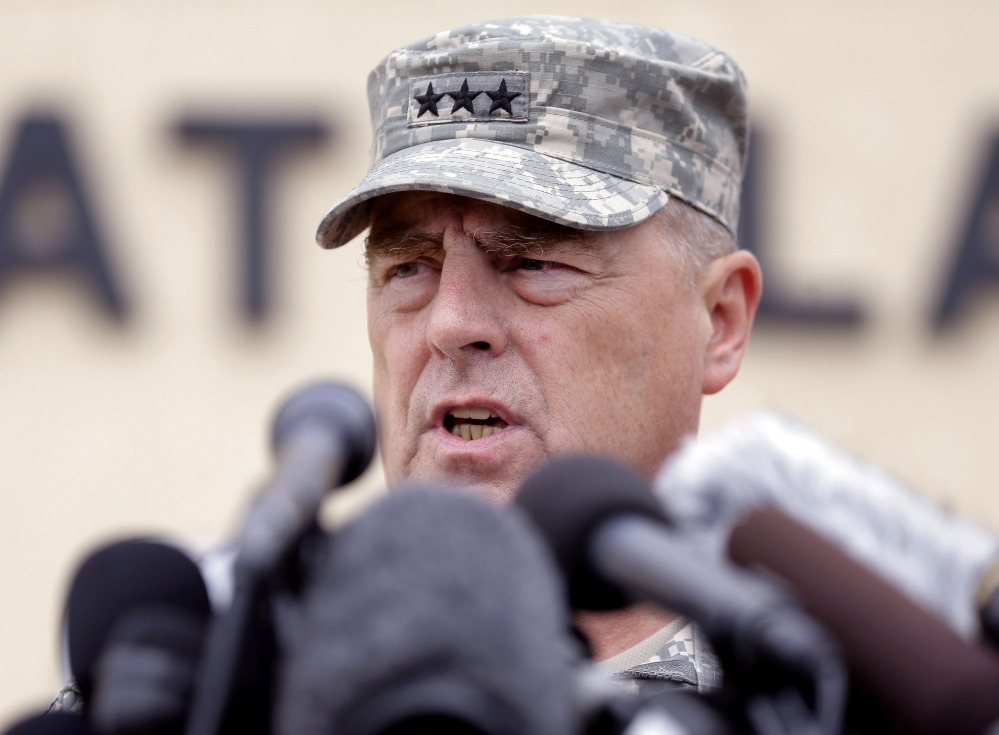 Army Secretary John M. McHugh, left, and Army Chief of Staff Gen Raymond Odierno update members of the Senate Armed Services Committee Thursday about the deadly shooting rampage by a soldier at Fort Hood in Texas.