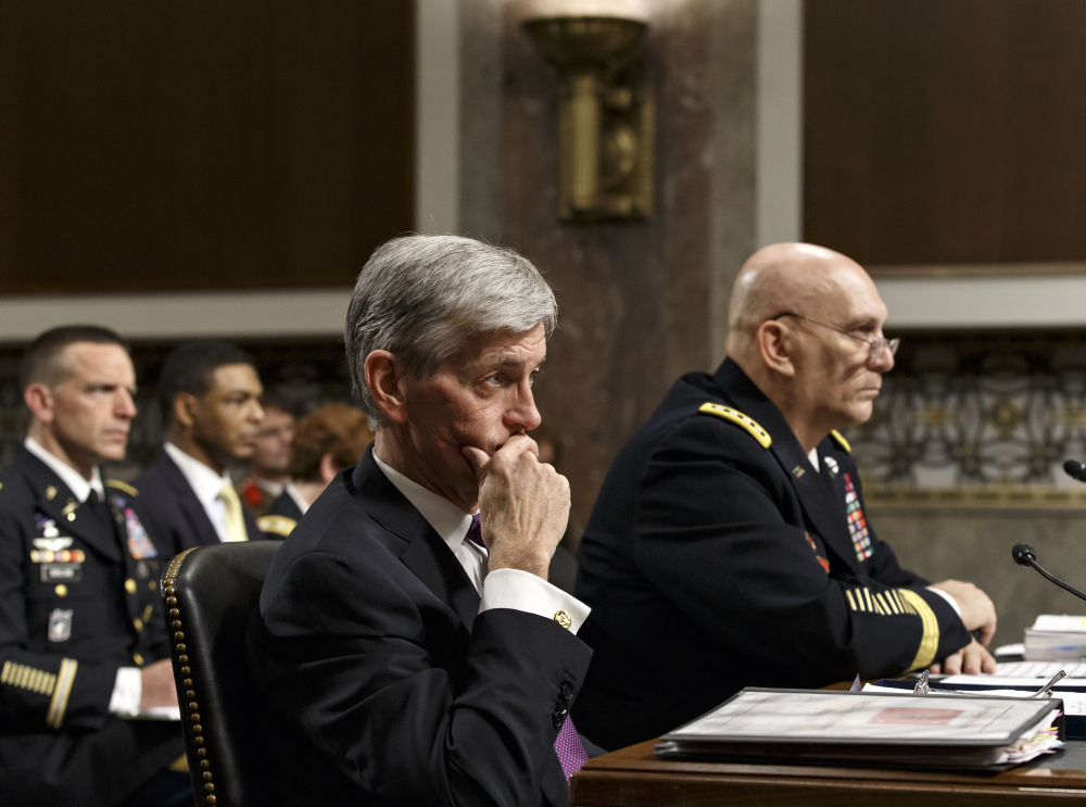 Army Secretary John M. McHugh, left, and Army Chief of Staff Gen Raymond Odierno update members of the Senate Armed Services Committee about the deadly shooting rampage by a soldier yesterday at Fort Hood in Texas, Thursday, April 3, 2014, on Capitol Hill in Washington. An Iraq War veteran being treated for mental illness was the gunman who opened fire at Fort Hood, killing three people and wounding 16 others before committing suicide, in an attack on the same Texas military base where more than a dozen people were slain in 2009.