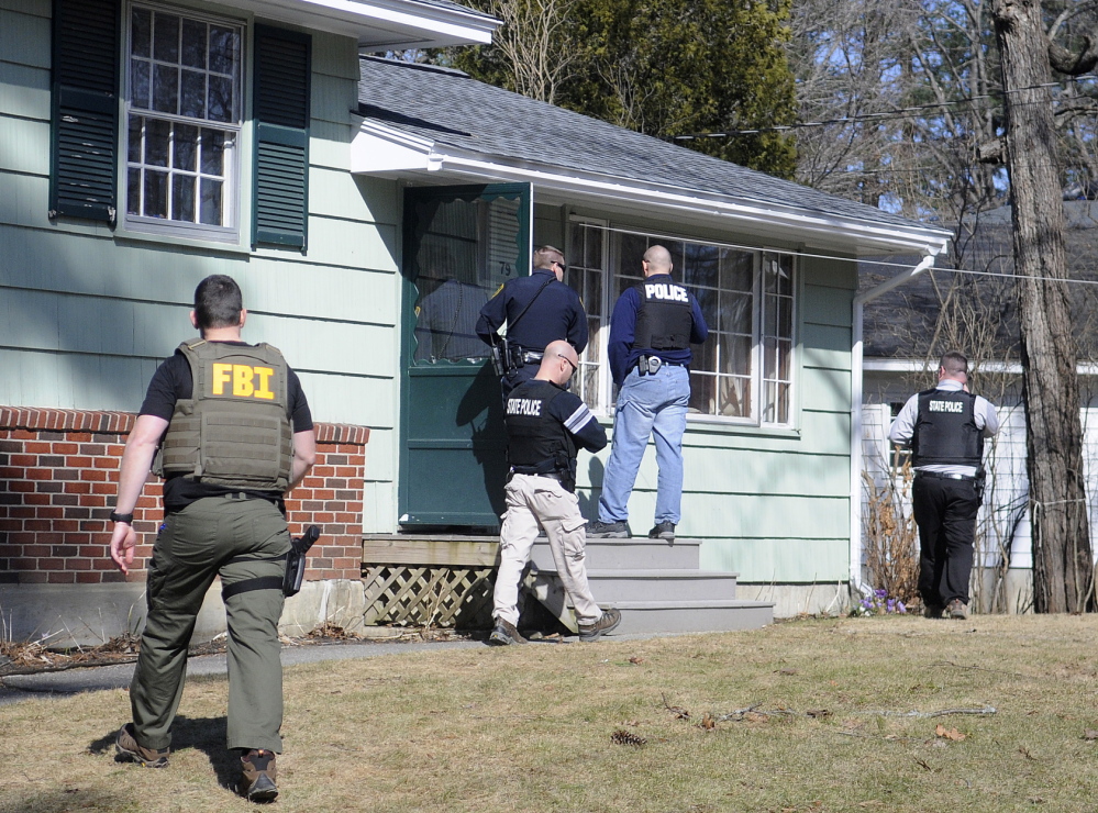 RAID: Police search Augusta residence Thursday where Gretchen Patrick, 51, was summoned on a charge of sex trafficking. Police allege that Patrick operated “Sarah’s Place” from a mobile home on Route 126 in Litchfield.