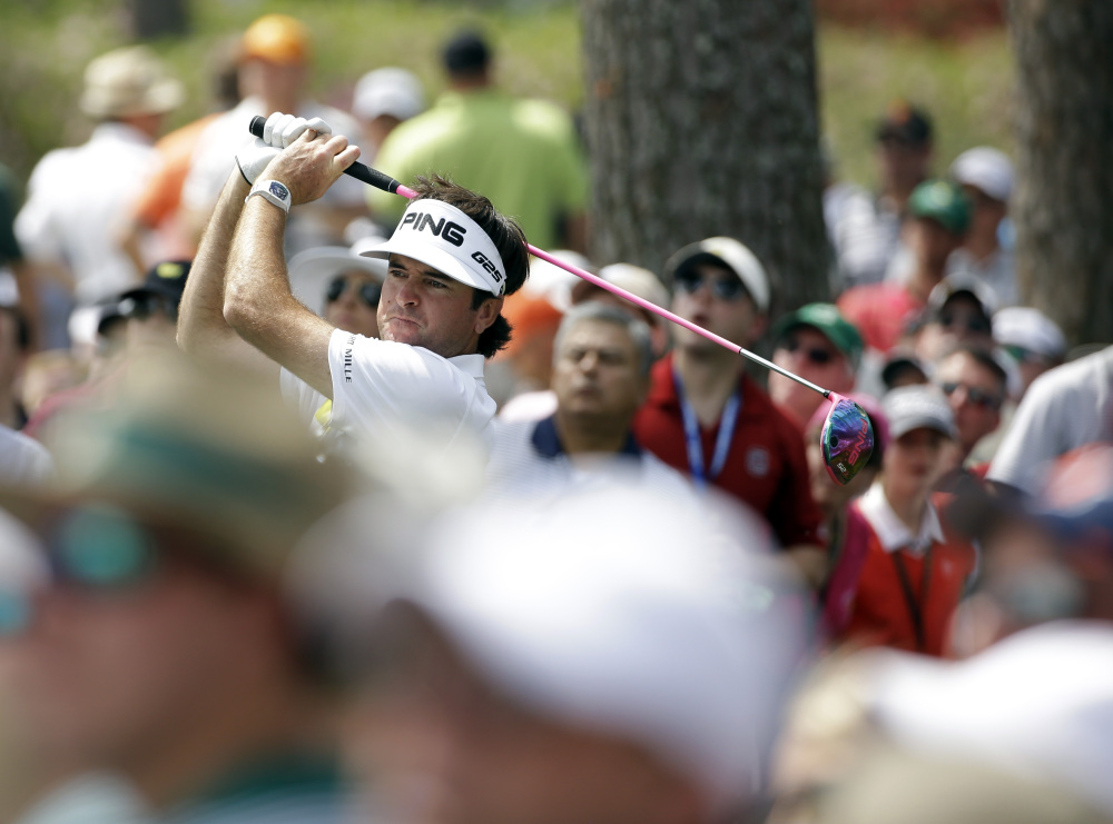 Bubba Watson tees off on the 17th hole during the second round of the Masters golf tournament Friday, April 11, 2014, in Augusta, Ga.