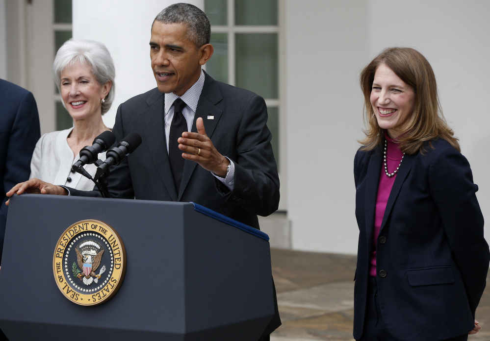 President Barack Obama stands with outgoing Health and Human Services Secretary Kathleen Sebelius, left, and his nominee to be her replacement, Budget Director Sylvia Mathews Burwell in the Rose Garden of the White House Friday.