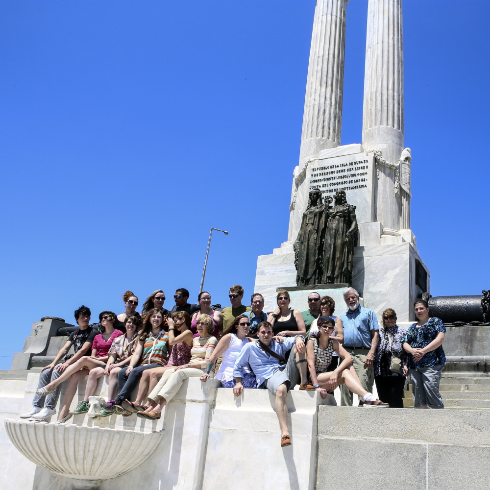 Spanish-American War relic: University of Maine at Augusta students visit the USS Maine Memorial during their recent trip to Cuba.