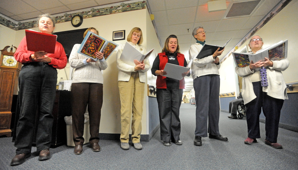Lifting Spirits: The Tourmaline Singers perform for the staff and residents at the Augusta Center for Health and Rehabilitation.