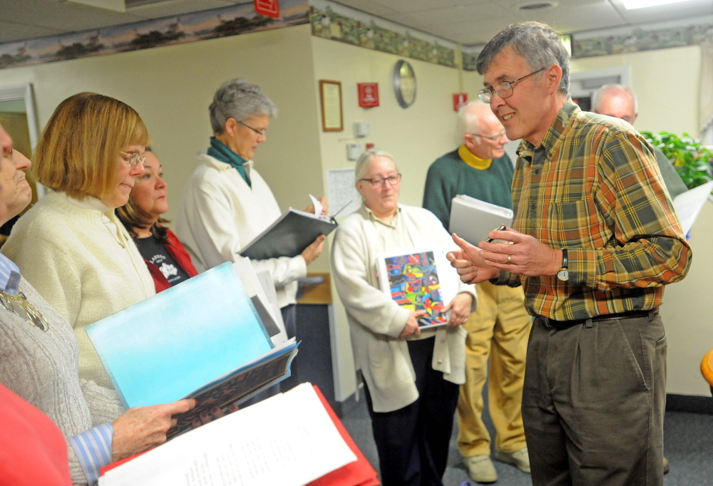 Soothe Souls: Harry Vayo, head of the Tourmaline Singers, directs the choir during a performance at the Augusta Center for Health and Rehabilitation.
