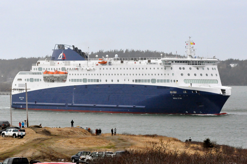 The Nova Star dwarfs some of the people who turned out on the outskirts of Yarmouth to watch the new ferry enter Yarmouth Harbour on Tuesday.