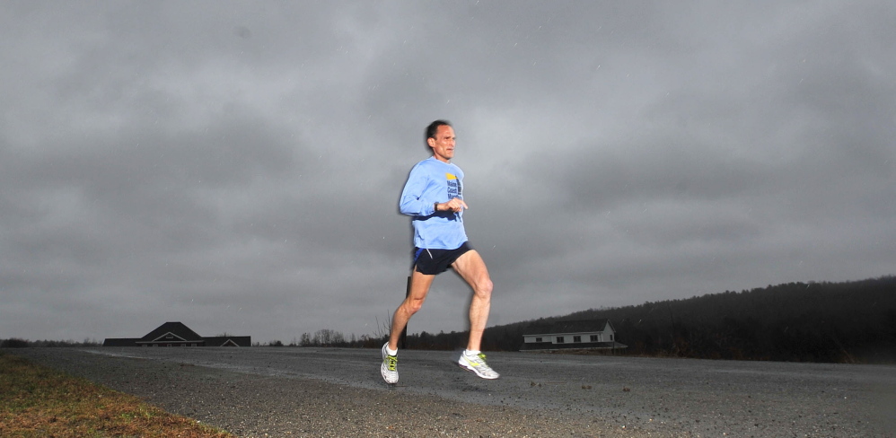last days of training: Brian Morin of Waterville trains near his Stream View home in Waterville on Tuesday. Morin will be running the Boston Marathon on Monday.
