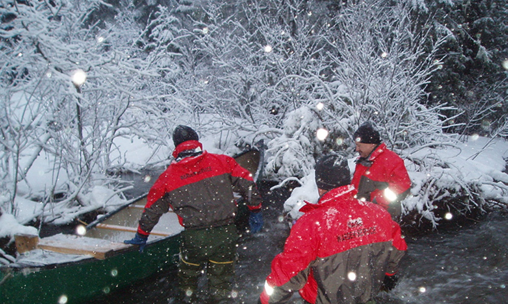 Maine wardens Gary Sibley, Ryan Fitzpatrick, and Alan Dudley are at work in Caswell on Tuesday night.