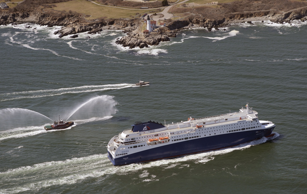 The Nova Star ferry passes Portland Head Light as it enters the channel leading to Portland Harbor on Thursday. While it’s docked in Portland, the vessel will be fitted with casino games and other equipment before its maiden voyage with paying customers on May 15.
