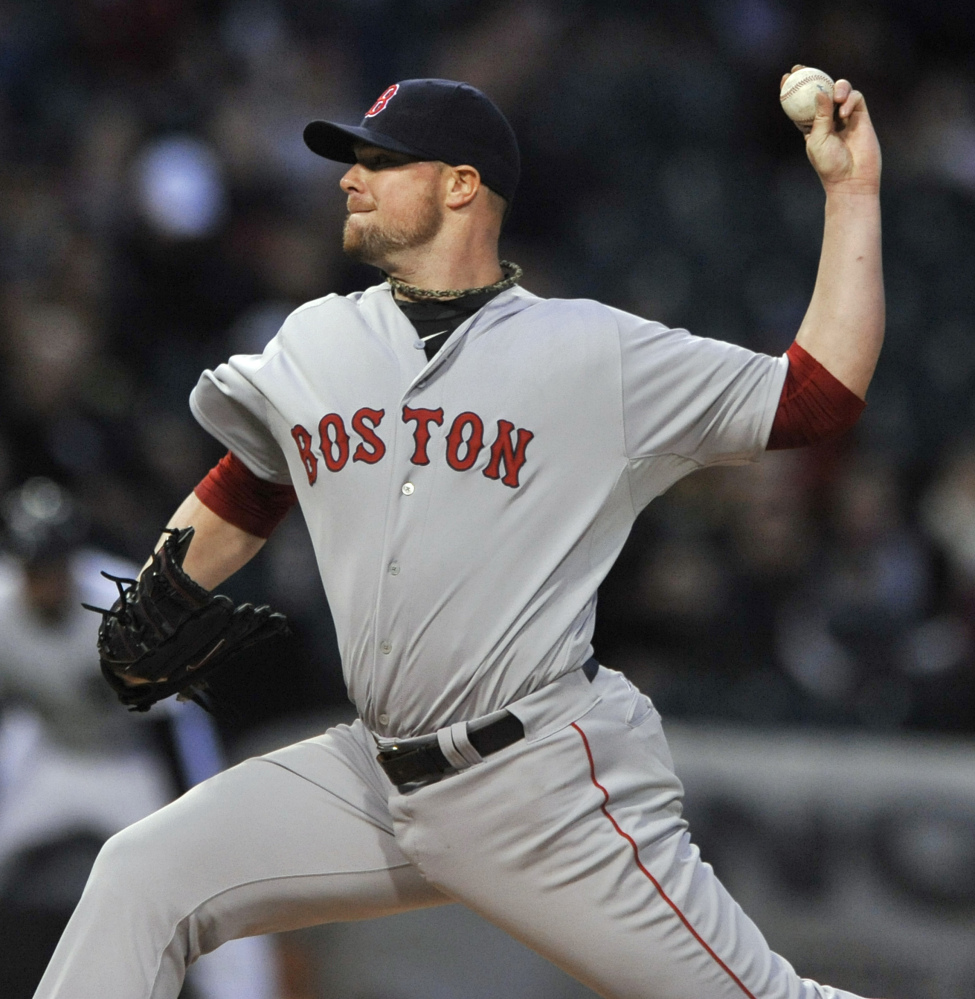 Boston Red Sox starter Jon Lester delivers a pitch in the first inning against the Chicago White Sox in Chicago on Thursday.