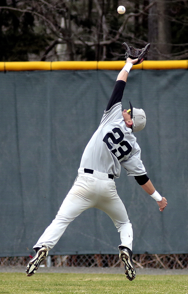 John Lefeber of Bowdoin makes a leaping catch in right field against USM. The Polar Bears are trying to get out of a slide, losing seven of their last 10.