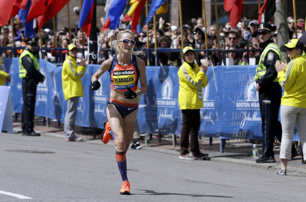 Home advantage: Shalane Flanagan approaches the finish line to finish fourth in the women’s division of the Boston Marathon in Boston. Flanagan is more determined than ever to win the race for her battered hometown. The Marblehead, Mass., native would be the first American winner since 1985.